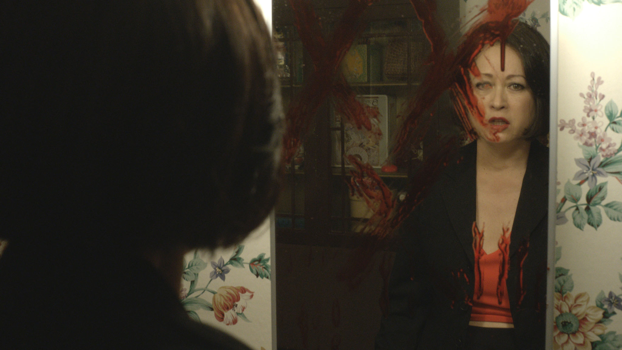 Julia Nickson plays Kat who faces an unexpected supernatural haunting. 