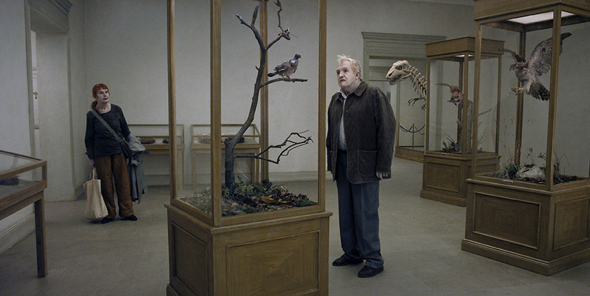 Delectably Dark And Drily Hilarious Trailer For Roy Andersson's A PIGEON SAT ON A BRANCH REFLECTING ON EXISTENCE