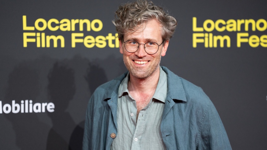 Locarno 2025 Interview: PHANTOMS OF JULY Director Julian Radlmeier on Quiet Politics, Surreal Humor, Psychogeographic Origins